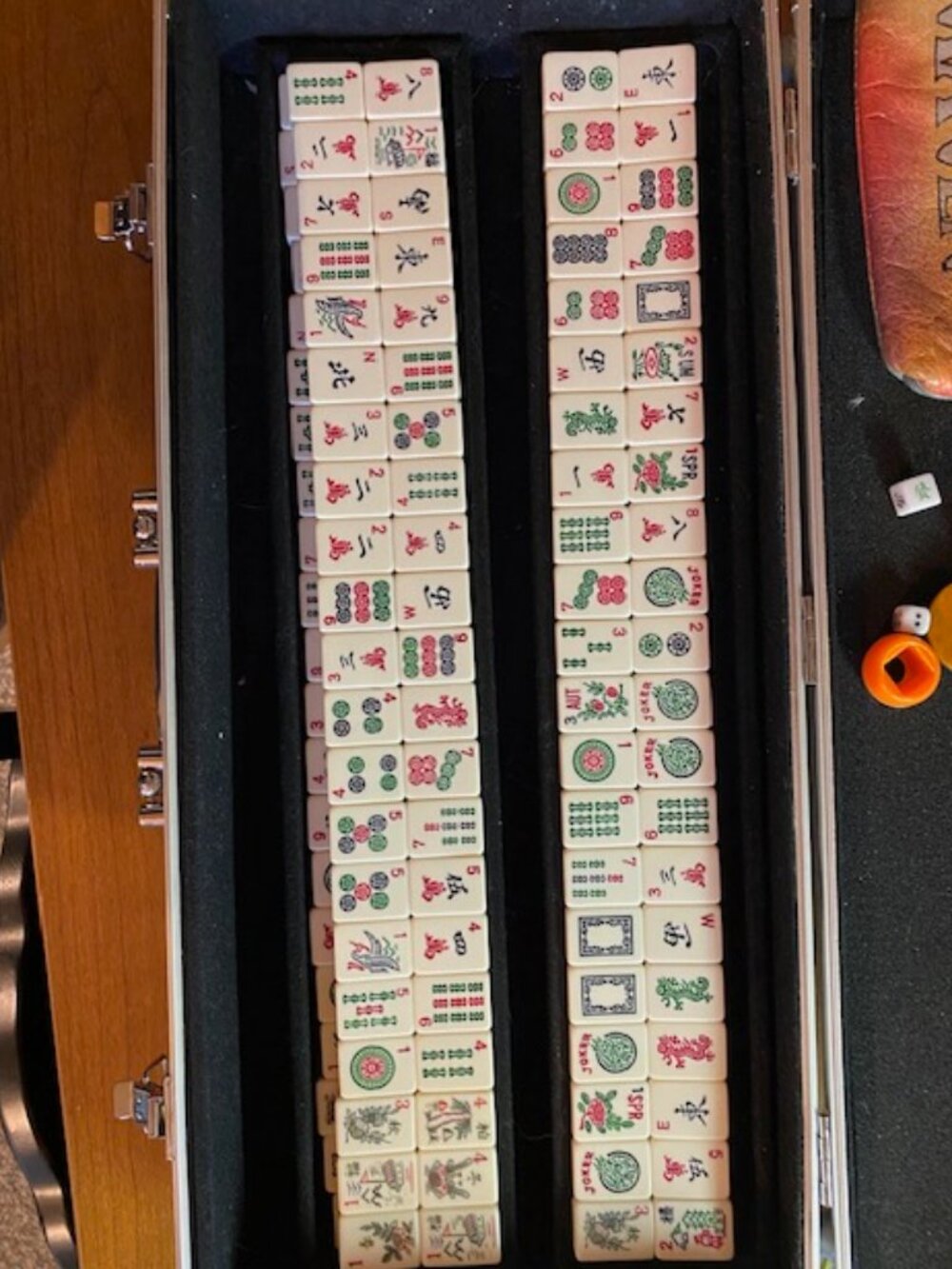 Mahjong set complete with 180 tiles steel case with wheels maybe from the 60's?